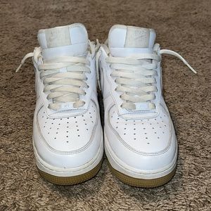 White Air Force ones with brown bottom